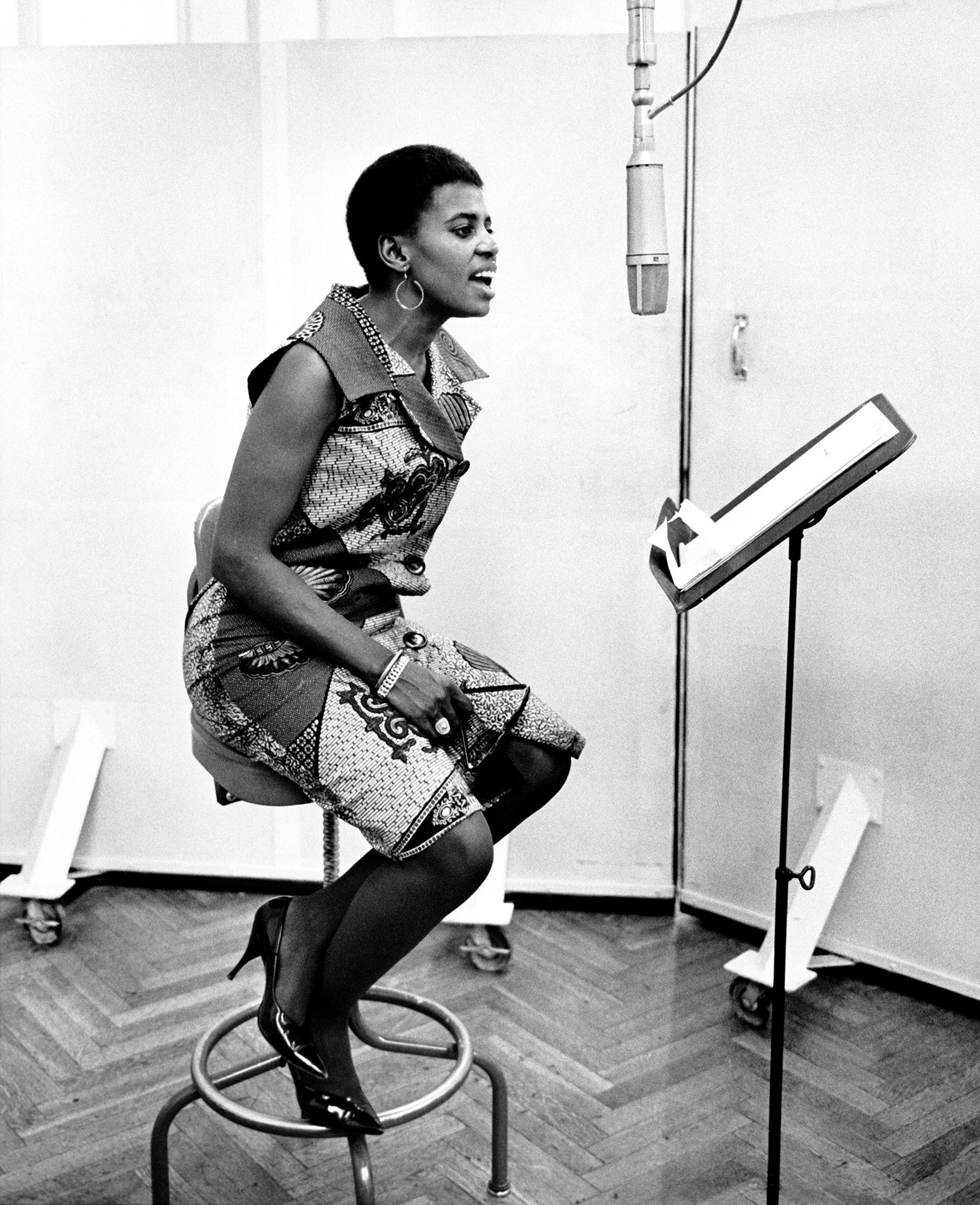 Miriam Makeba in the RCA studios in New York City, circa 1965. Photo via Michael Ochs Archives/Getty Images.